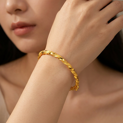 TAKA Jewellery Shimmering Twist 916 Gold Bracelet